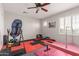 Bright gym with workout mats, balance beam, weights, fan, and plenty of room for fitness activities and exercise at 502 E Kona Dr, Casa Grande, AZ 85122
