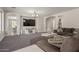 Comfortable living area with a large sectional sofa and stylish decor at 502 E Kona Dr, Casa Grande, AZ 85122