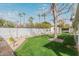 Manicured backyard features a lush lawn, mature trees, and charming landscaping, offering a serene outdoor retreat at 520 W Townley Ave, Phoenix, AZ 85021