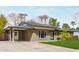 Charming single-story home featuring a well-maintained lawn, desert landscaping, and a convenient carport at 520 W Townley Ave, Phoenix, AZ 85021