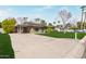Charming single-story home featuring a well-maintained lawn, desert landscaping, and a convenient carport at 520 W Townley Ave, Phoenix, AZ 85021