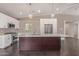 Bright kitchen featuring a center island, stainless steel appliances, and ample counter space at 520 W Townley Ave, Phoenix, AZ 85021