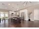 Open concept kitchen with stainless steel appliances, a large island, and modern white cabinetry at 520 W Townley Ave, Phoenix, AZ 85021