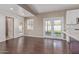 Open living space with hardwood floors, french doors and neutral walls at 520 W Townley Ave, Phoenix, AZ 85021