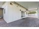 A covered patio with paved flooring that provides a shaded outdoor space to relax and enjoy the scenery at 520 W Townley Ave, Phoenix, AZ 85021