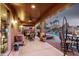 The large covered patio overlooks a large swimming pool at 631 W Stanley Ave, San Tan Valley, AZ 85140