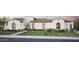 Beautiful single-story home boasts manicured lawn, and a neutral color palette, accented by warm lighting and a charming walkway at 6621 E Doubletree Ranch Rd, Paradise Valley, AZ 85253