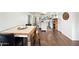 Modern kitchen with stainless steel appliances, white cabinets and a large island at 7102 W Wilshire Dr, Phoenix, AZ 85035