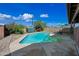 Beautiful backyard pool area with lush landscaping and a relaxing atmosphere at 7102 W Wilshire Dr, Phoenix, AZ 85035