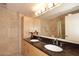 Modern bathroom features a double vanity with granite countertops at 7121 E Rancho Vista Dr # 1008, Scottsdale, AZ 85251