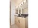 Bathroom features a vanity with granite countertop and dual mirrors at 7121 E Rancho Vista Dr # 1008, Scottsdale, AZ 85251