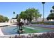 View of Scottsdale City Hall with water fountain and manicured landscaping at 7121 E Rancho Vista Dr # 1008, Scottsdale, AZ 85251