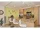 Modern kitchen featuring a large island with bar seating, stainless steel appliances, and granite countertops at 7121 E Rancho Vista Dr # 1008, Scottsdale, AZ 85251