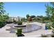 Interactive splash pad area with playful water features and seating for relaxation at 7121 E Rancho Vista Dr # 1008, Scottsdale, AZ 85251