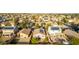 Aerial view of a home in a residential area with desert landscaping at 7336 S 253Rd Ave, Buckeye, AZ 85326