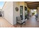 Spacious covered patio with tile flooring, providing a comfortable outdoor living area with room for relaxing at 7350 E Arlington Rd, Scottsdale, AZ 85250