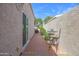 Private outdoor patio with brick flooring, offering an intimate setting for dining and relaxation at 7350 E Arlington Rd, Scottsdale, AZ 85250