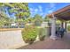 Relaxing outdoor patio with a seating area and view of the lush landscaping at 7350 E Arlington Rd, Scottsdale, AZ 85250