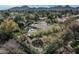 Aerial view of the property showcasing the home, pool, backyard, and surrounding neighborhood at 8325 N 73Rd Pl, Scottsdale, AZ 85258