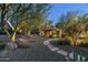 Picturesque outdoor space with a gazebo and charming stone pathway at 8325 N 73Rd Pl, Scottsdale, AZ 85258