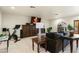 Relaxing living room with travertine floors, a comfy sofa, and entertainment setup at 8325 N 73Rd Pl, Scottsdale, AZ 85258