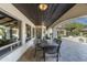 Spacious outdoor patio featuring an outdoor dining area and outdoor fireplace, perfect for entertaining at 8325 N 73Rd Pl, Scottsdale, AZ 85258