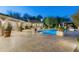 Beautiful backyard pool with travertine deck, ideal for entertaining guests at 8325 N 73Rd Pl, Scottsdale, AZ 85258