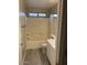 Bathroom features a shower over bath and a sink with a vanity unit at 8929 E Bramble Ave, Mesa, AZ 85208