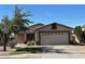 Charming single-story home featuring a two-car garage and well-maintained landscaping at 8929 E Bramble Ave, Mesa, AZ 85208