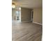 Living room featuring neutral paint and wood floors at 8929 E Bramble Ave, Mesa, AZ 85208