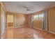 Spacious bedroom with hardwood floors, ceiling fan and large windows at 9022 N 39Th Ave, Phoenix, AZ 85051