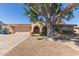 Inviting single story home with desert landscaping and mature tree in the front yard at 9022 N 39Th Ave, Phoenix, AZ 85051