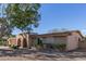 Charming single-story home with neutral color palette and desert landscaping at 9022 N 39Th Ave, Phoenix, AZ 85051