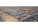 Scenic aerial shot of a well-maintained community featuring neat rows of homes and organized street patterns at 11447 E Utah Ave, Mesa, AZ 85212