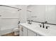 Clean bathroom with double sink vanity, white cabinets, and a shower-tub combination with subway tile at 11447 E Utah Ave, Mesa, AZ 85212