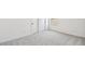 Bright bedroom featuring plush gray carpet and a neutral color palette at 11447 E Utah Ave, Mesa, AZ 85212