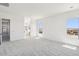 Spacious bedroom featuring neutral carpeting and lots of bright light at 11447 E Utah Ave, Mesa, AZ 85212