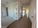 Bright entryway featuring tile flooring, white walls, and doors creating a welcoming atmosphere at 11447 E Utah Ave, Mesa, AZ 85212