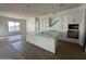 Bright kitchen with white cabinets, a large island, and modern finishes ready for cooking at 11447 E Utah Ave, Mesa, AZ 85212