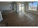 Bright living area with tile flooring, sliding glass doors, and lots of natural light at 11447 E Utah Ave, Mesa, AZ 85212