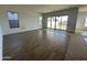 Open concept living room with tile flooring, modern windows, and bright, airy atmosphere at 11447 E Utah Ave, Mesa, AZ 85212