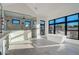 Bright bathroom with a soaking tub and frameless glass shower, black framed windows, and modern fixtures at 11841 N 65Th Pl, Scottsdale, AZ 85254