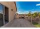 Large balcony with metal railing, a beautiful view, and a sliding glass door at 13212 W Lisbon Ln, Surprise, AZ 85379