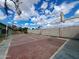 Backyard with a basketball court against a blue sky, offering a recreational area for outdoor activities at 13805 N 31St Ave, Phoenix, AZ 85053