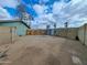 Extensive backyard area featuring block walls, palm trees, and fencing that create a private outdoor space at 13805 N 31St Ave, Phoenix, AZ 85053