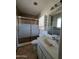 Standard bathroom featuring a shower with sliding door at 13805 N 31St Ave, Phoenix, AZ 85053