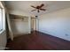 Bedroom with window and ceiling fan at 13805 N 31St Ave, Phoenix, AZ 85053