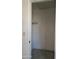 Small closet with a shelf and tiled floor at 13805 N 31St Ave, Phoenix, AZ 85053