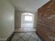 Welcoming entryway with tiled flooring and a view into the spacious living area at 13805 N 31St Ave, Phoenix, AZ 85053