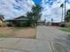 A charming single-story home complete with an expansive driveway at 13805 N 31St Ave, Phoenix, AZ 85053